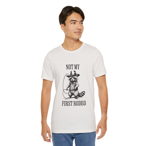 Not My First Rodeo Cowboy Raccoon Shirt, Funny Western Graphic Cotton Tee, Cute Quirky Country Style T-Shirt for Rodeo Fans & Animal Lovers
