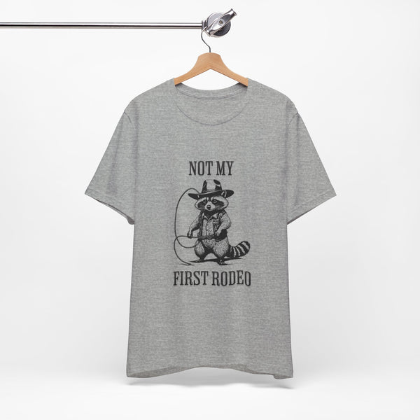 Not My First Rodeo Cowboy Raccoon Shirt, Funny Western Graphic Cotton Tee, Cute Quirky Country Style T-Shirt for Rodeo Fans & Animal Lovers